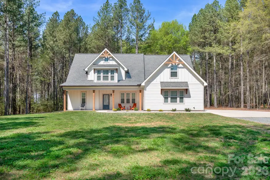 Front exterior of a new home in , Marshville, NC, highlighting curb appeal (Image 1). Front exterior of a new home in , Marshville, NC, highlighting curb appeal (Image 1).
