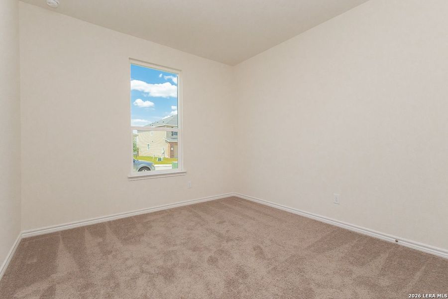 Spacious, unfurnished interior of a new home in Hidden Bluffs at TRP, San Antonio (Image 9).