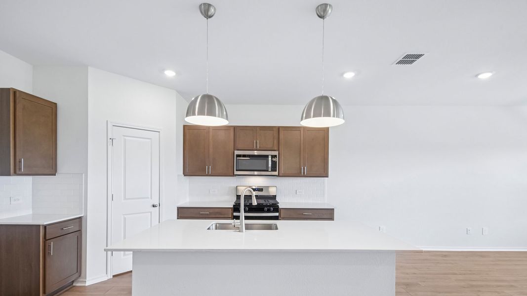 Furnished interior view inside a new home in Valverde, Bastrop (Image 7).