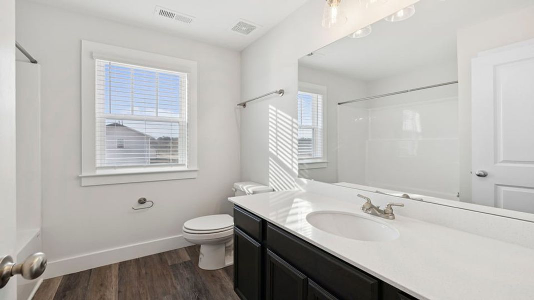 Representative furnished interior of a home built from the Phoenix by D.R. Horton in Edgewood Estates, Greenville (Image 5).