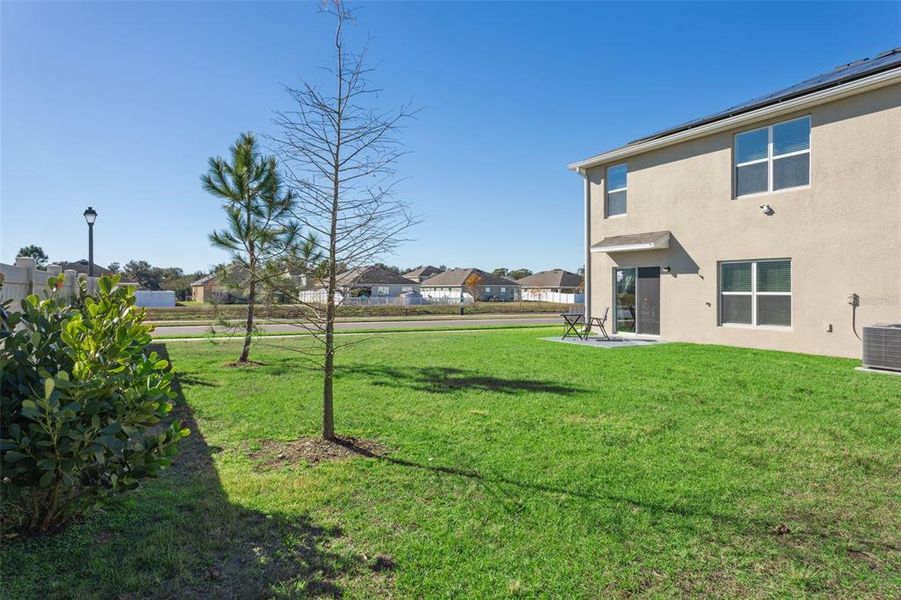 Exterior details and patio area of a home in Zephyr Ridge, Zephyrhills (Image 3). Exterior details and patio area of a home in Zephyr Ridge, Zephyrhills (Image 3).