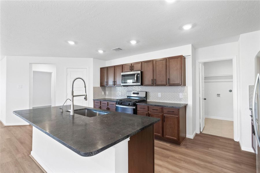 Furnished interior view inside a new home in Olympia Falls, Fresno (Image 9). Furnished interior view inside a new home in Olympia Falls, Fresno (Image 9).
