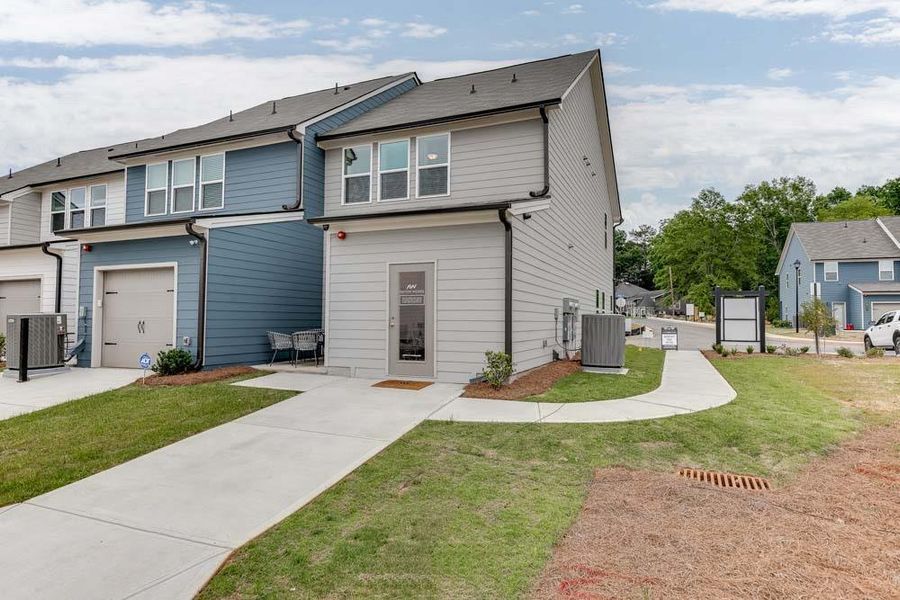 Front exterior of a new home in Laurelwood, Douglasville, GA, highlighting curb appeal (Image 23).
