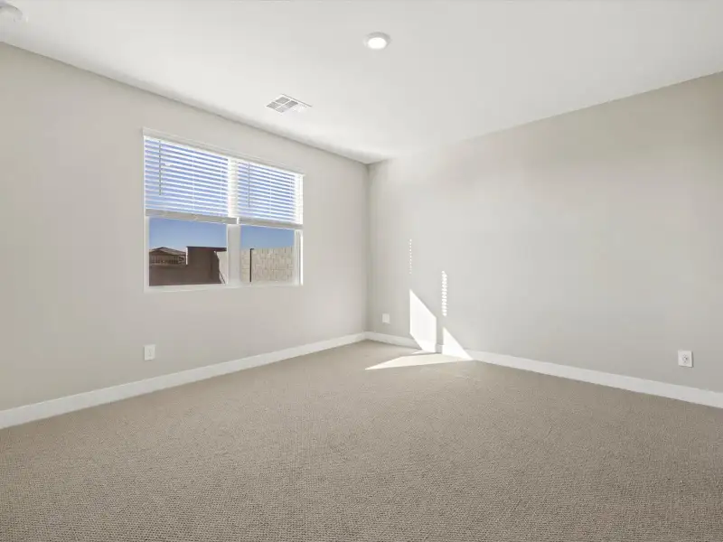 Spacious, unfurnished interior of a new home in White Tank Foothills Reserve Series, Waddell (Image 14). Spacious, unfurnished interior of a new home in White Tank Foothills Reserve Series, Waddell (Image 14).