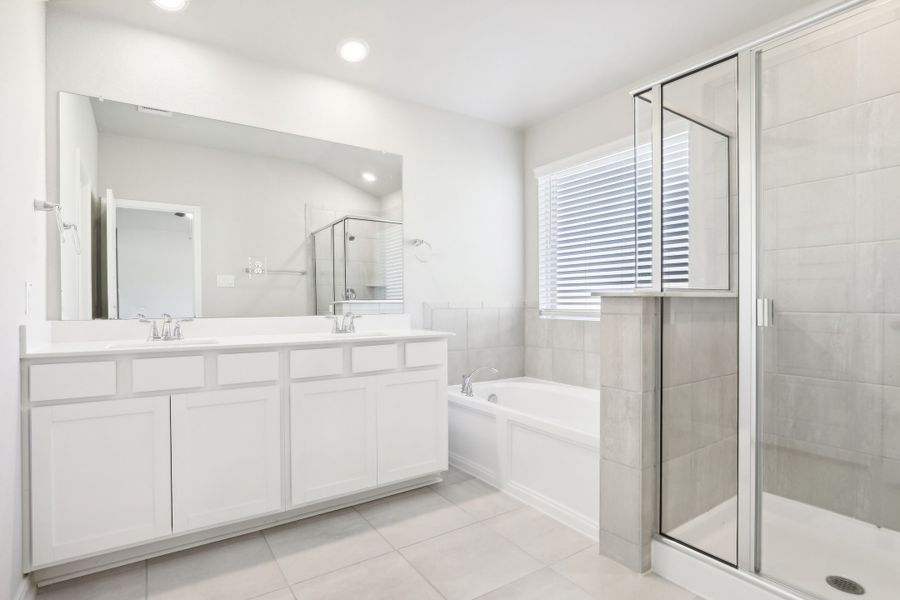 Primary suite bathroom in the Oleander floorplan at a Meritage Homes community. Primary suite bathroom in the Oleander floorplan at a Meritage Homes community.