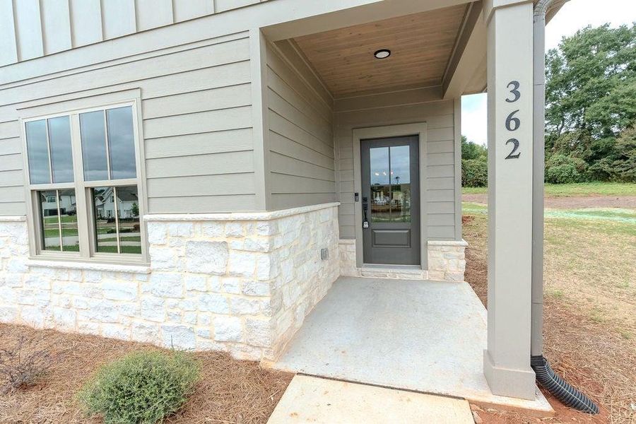 Exterior details and patio area of a home in , Hoschton (Image 32).