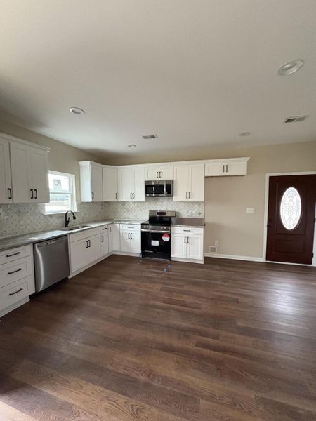 Furnished interior view inside a new home in , Santee (Image 3). Furnished interior view inside a new home in , Santee (Image 3).