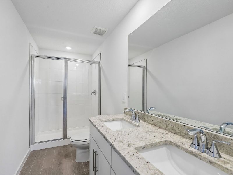 Furnished interior view inside a new home in The District at Oakleaf - The Commons, Middleburg (Image 9).