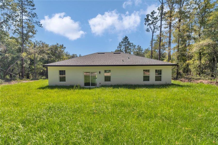 Front exterior of a new home in , Citrus Springs, FL, highlighting curb appeal (Image 24).