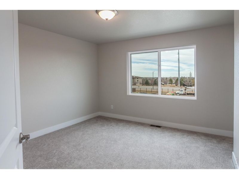 Spacious, unfurnished interior of a new home in Wilson Commons, Loveland (Image 40).