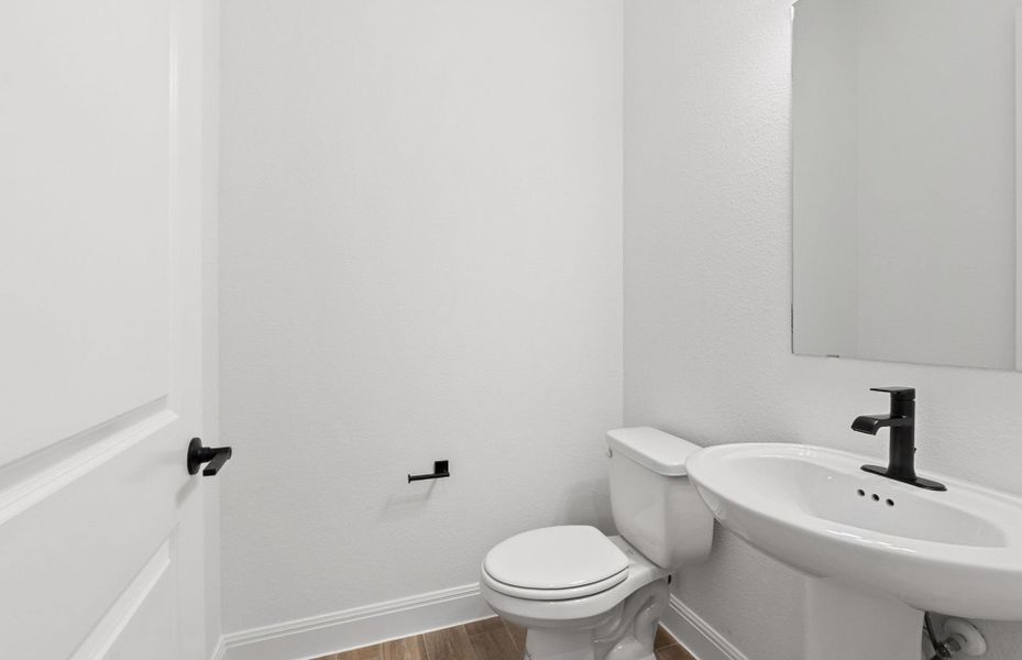 Furnished interior view inside a new home in Bluffview Reserve, Leander (Image 7).