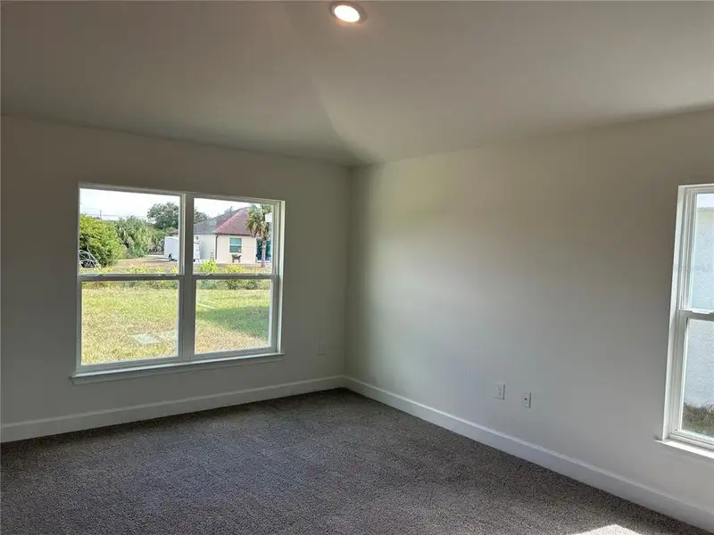 Spacious, unfurnished interior of a new home in Watercress Cove, North Port (Image 14). Spacious, unfurnished interior of a new home in Watercress Cove, North Port (Image 14).
