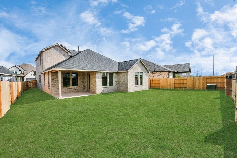 Exterior details and patio area of a home in 50' Traditional Homes at Elyson, Katy (Image 3).