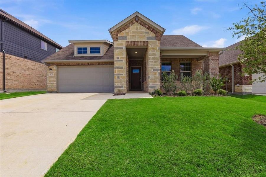 Front exterior of a new home in Tesoro at Chisholm Trail Ranch, Crowley, TX, highlighting curb appeal (Image 27). Front exterior of a new home in Tesoro at Chisholm Trail Ranch, Crowley, TX, highlighting curb appeal (Image 27).
