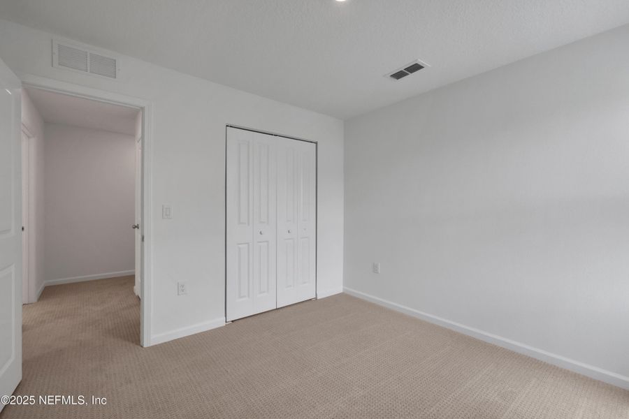 Spacious, unfurnished interior of a new home in Cordova Palms, St. Augustine (Image 29).