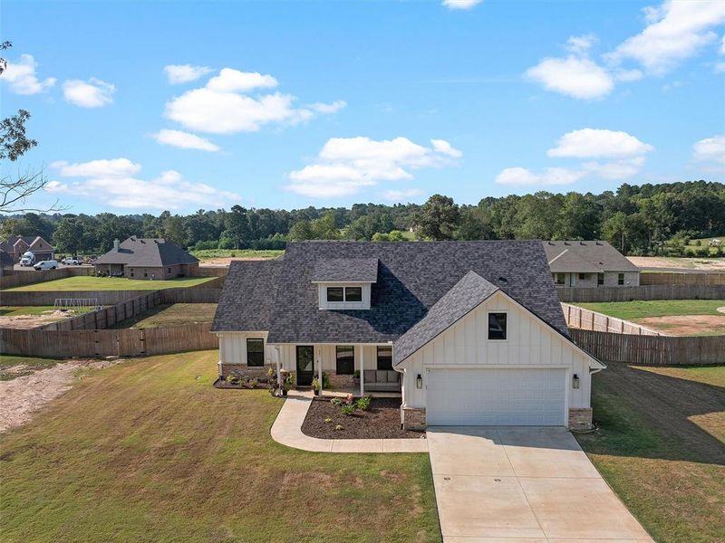 Front exterior of a new home in , Kilgore, TX, highlighting curb appeal (Image 20). Front exterior of a new home in , Kilgore, TX, highlighting curb appeal (Image 20).