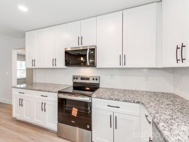 Furnished interior view inside a new home in , Monroe (Image 10).