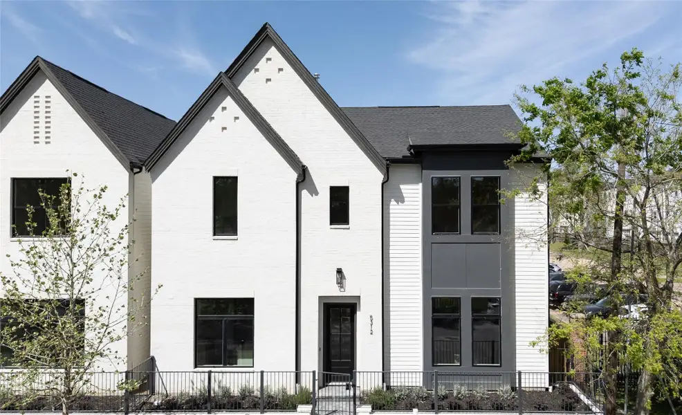 Exceptional Curb Appeal - This home comes with a well-proportioned handsome elevation. Elegant combination of hand slurred brick, painted carriage style garage door with a terracotta paver driveway.