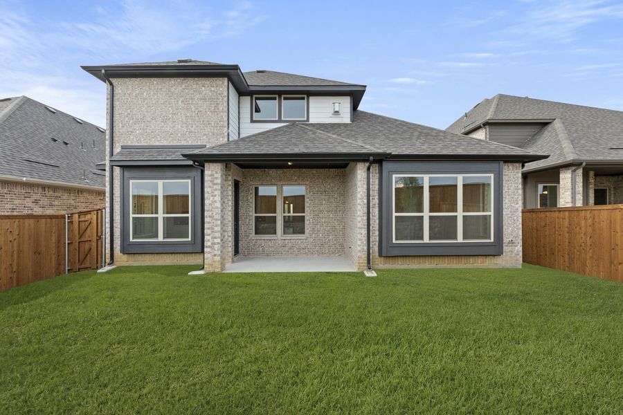 Exterior details and patio area of a home in Brookshire at Legacy Hills, Celina (Image 3).