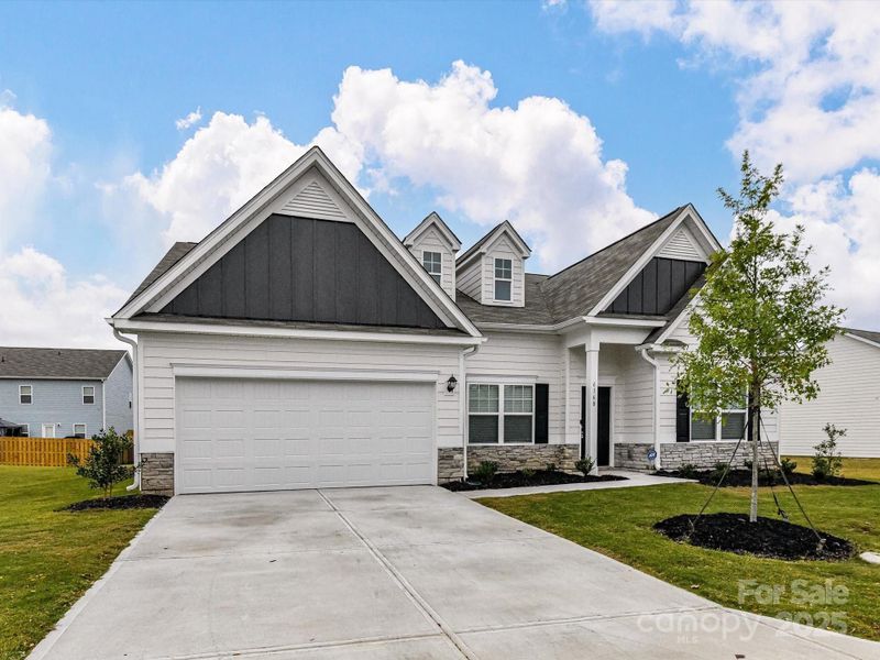 Front exterior of a new home in , Midland, NC, highlighting curb appeal (Image 19).