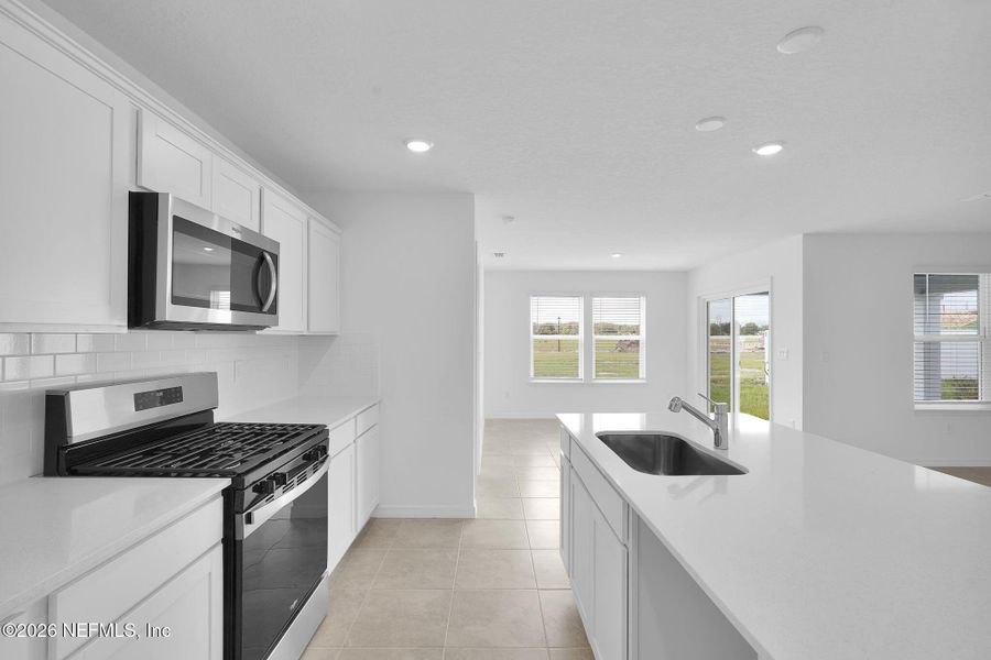 Furnished interior view inside a new home in Wells Landing, Jacksonville (Image 8).