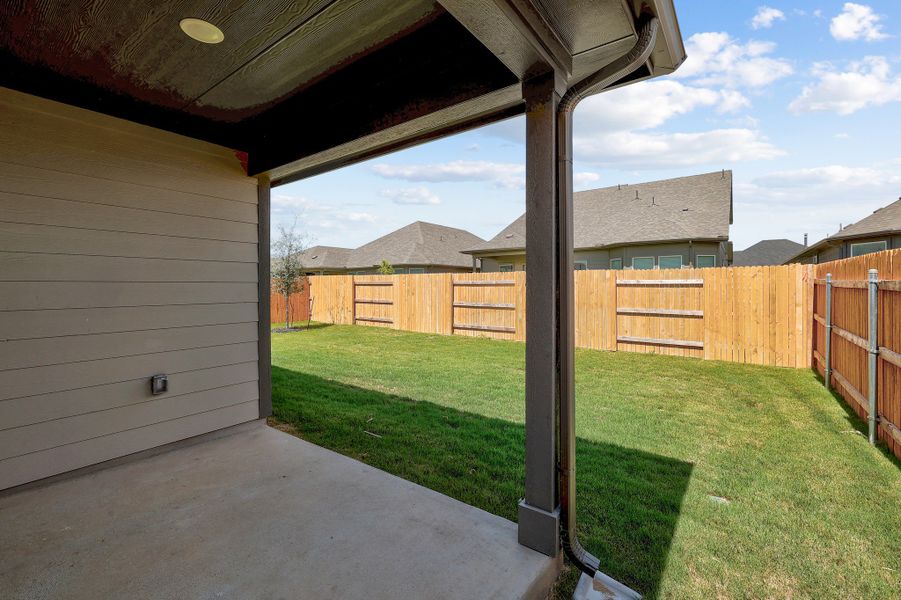 Exterior details and patio area of a home in Prairie Winds, Hutto (Image 3).