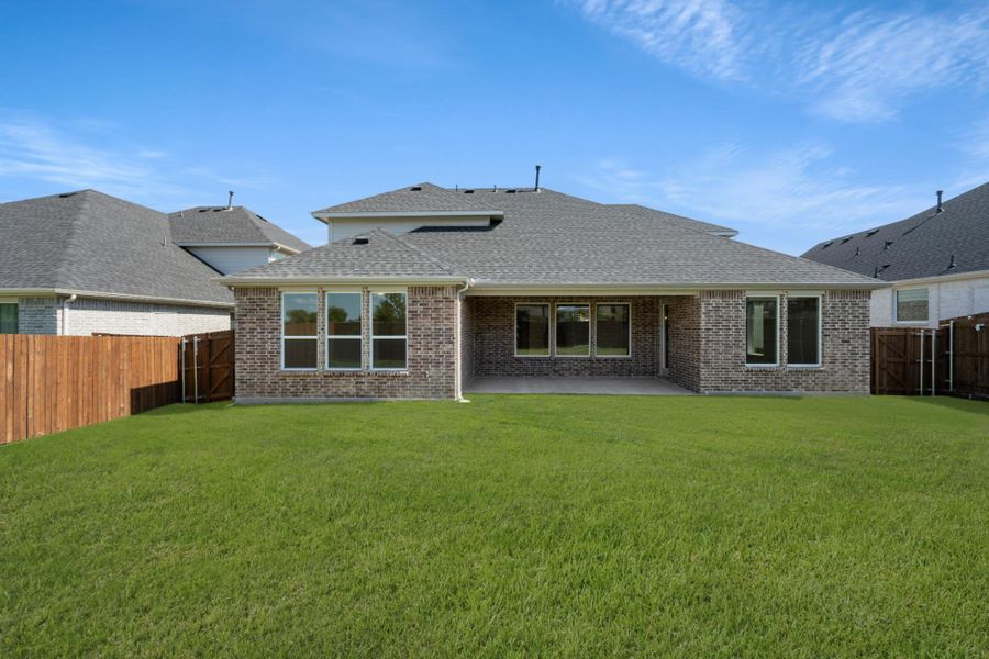 Exterior details and patio area of a home in Inspiration Collection at View at the Reserve, Mansfield (Image 2).