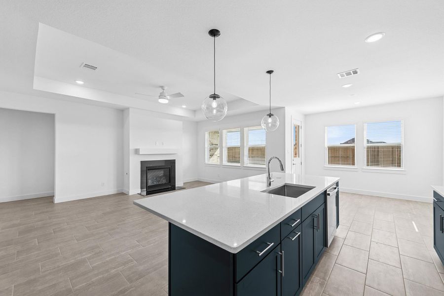 Kitchen overlooks cozy great room
