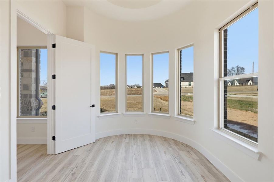 4th bedroom with curved windows facing front of home. 4th bedroom with curved windows facing front of home.