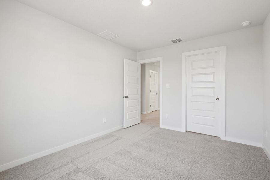 A room with white doors.