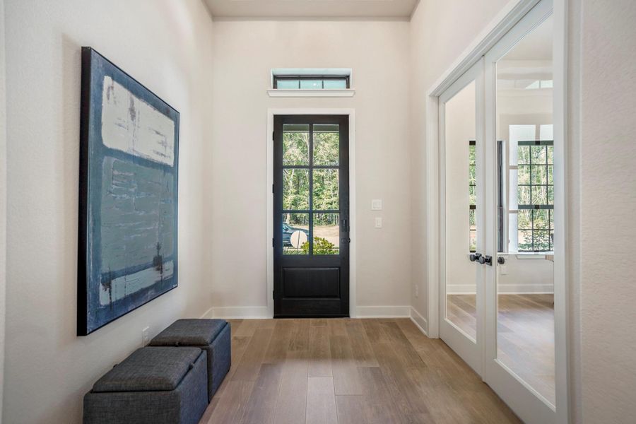Furnished interior view inside a new home in ARTAVIA, Conroe (Image 17).