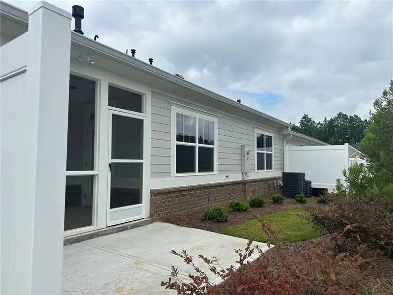 Exterior details and patio area of a home in , Cumming (Image 4). Exterior details and patio area of a home in , Cumming (Image 4).