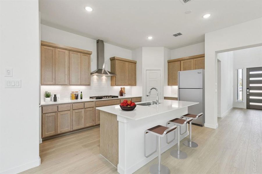 Kitchen in the Da Vinci II home plan by Trophy Signature Homes – REPRESENTATIVE PHOTO