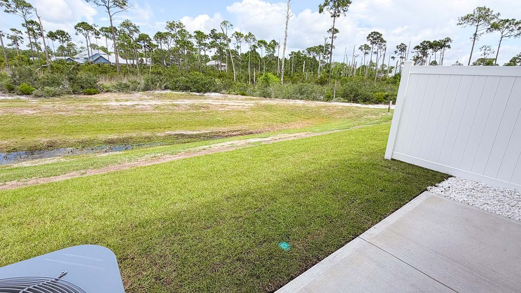 Exterior details and patio area of a home in WindMark Beach, Port Saint Joe (Image 23).