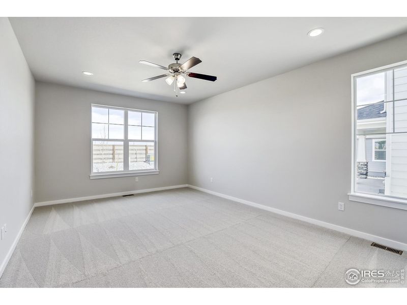 Spacious, unfurnished interior of a new home in Barefoot Lakes, Firestone (Image 13).