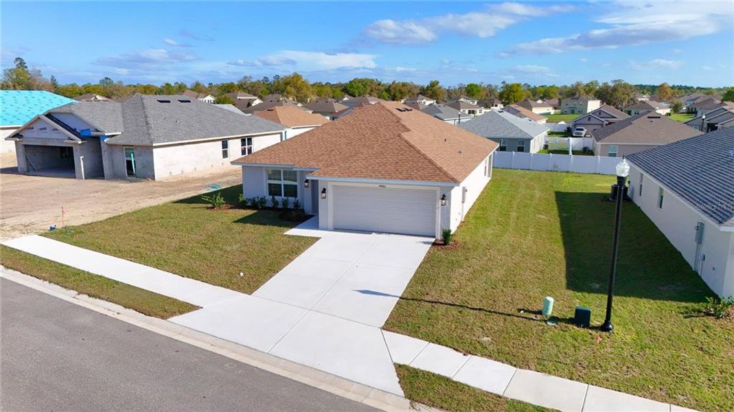 Front exterior of a new home in , Ocala, FL, highlighting curb appeal (Image 1). Front exterior of a new home in , Ocala, FL, highlighting curb appeal (Image 1).