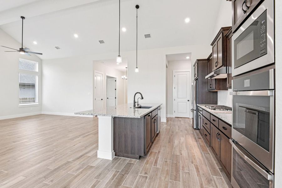 Furnished interior view inside a new home in Village at Three Oaks, Seguin (Image 12). Furnished interior view inside a new home in Village at Three Oaks, Seguin (Image 12).
