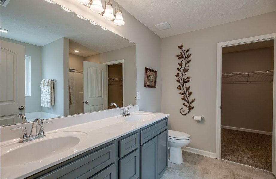 Primary Bathroom.

*Photos are from a staged model home of floor plan. Options and Selections may vary in actual home.
