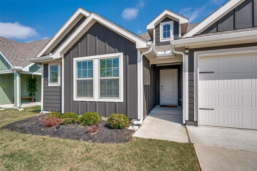 Front exterior of a new home in Enclave at Pecan Creek, Providence Village, TX, highlighting curb appeal (Image 1). Front exterior of a new home in Enclave at Pecan Creek, Providence Village, TX, highlighting curb appeal (Image 1).