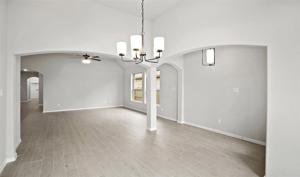 View of dining room and great room (*Photo not of actual home and used for illustration purposes only.)