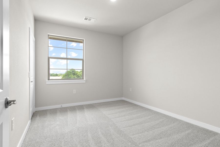 Spacious, unfurnished interior of a new home in The Tribute, The Colony (Image 43).