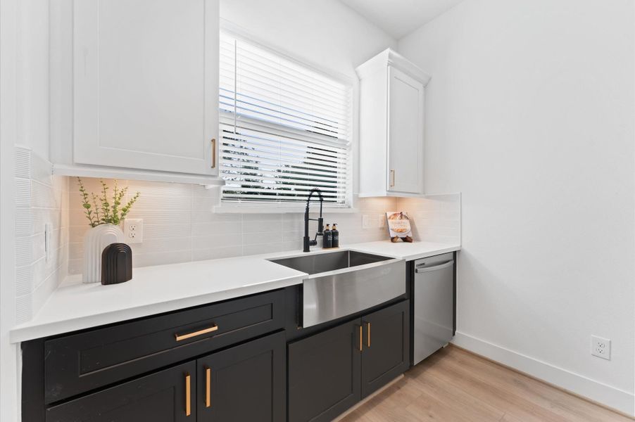 Elegant bathroom featuring a sleek glass-enclosed shower and a freestanding tub, perfect for relaxation.