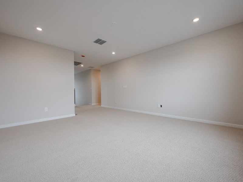 A room with a white wall and a white floor.