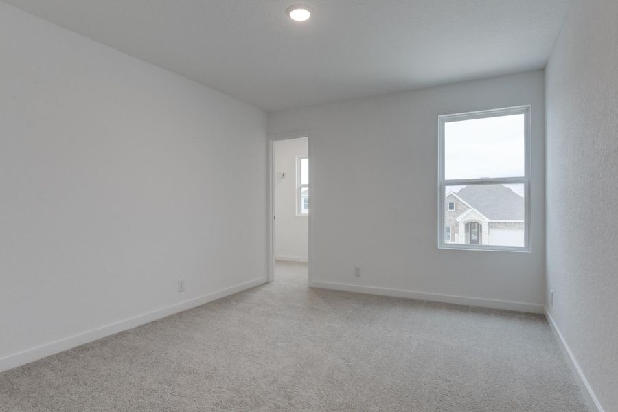 Representative unfurnished interior of a home built from the Alexis by Ashton Woods in Nopal Valley, San Antonio (Image 27).