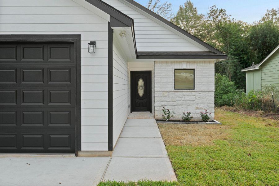 Exterior details and patio area of a home in , Willis (Image 18). Exterior details and patio area of a home in , Willis (Image 18).