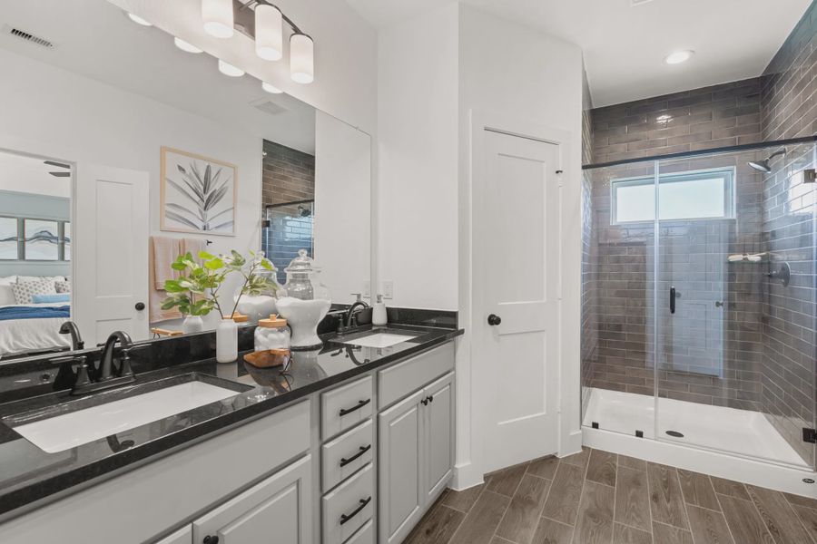 Representative furnished interior of a home built from the Countryside by Chesmar Homes in Meridiana Townhomes, Iowa Colony (Image 11).