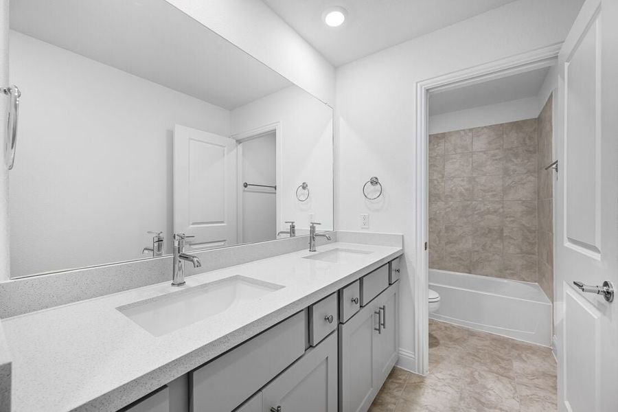 Representative furnished interior of a home built from the Lunaria by Taylor Morrison in Madero 50s, Fort Worth (Image 15).