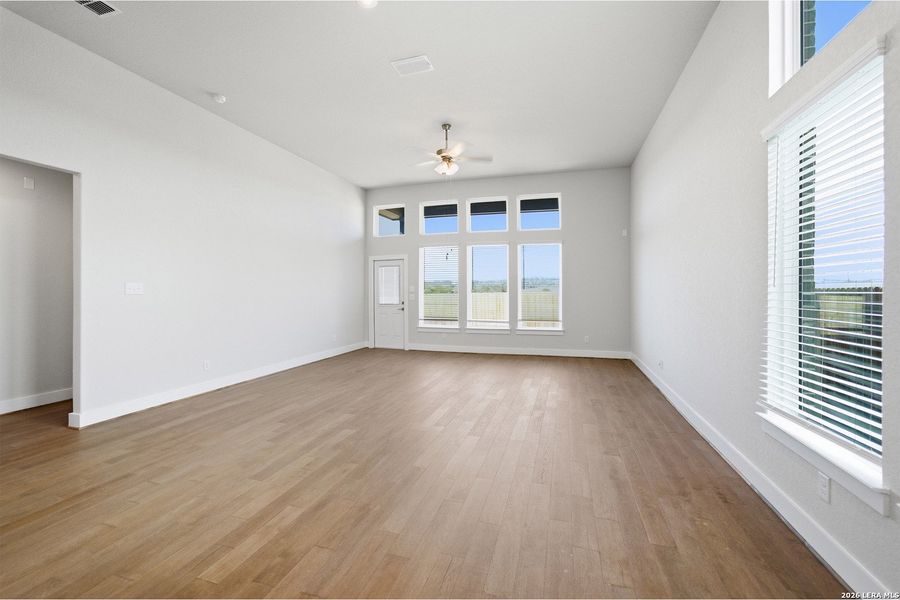 Spacious, unfurnished interior of a new home in The Woodlands at Medina Hills, Mico (Image 26).