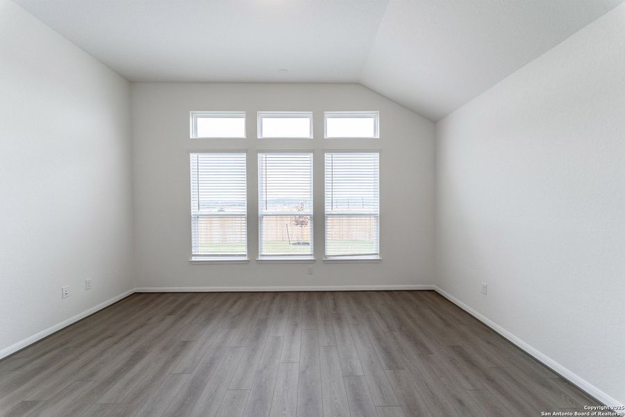 Spacious, unfurnished interior of a new home in The Woodlands at Medina Hills, Mico (Image 14).