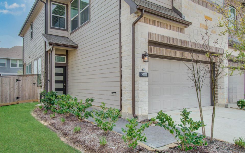 Exterior details and patio area of a home in , Cypress (Image 29).